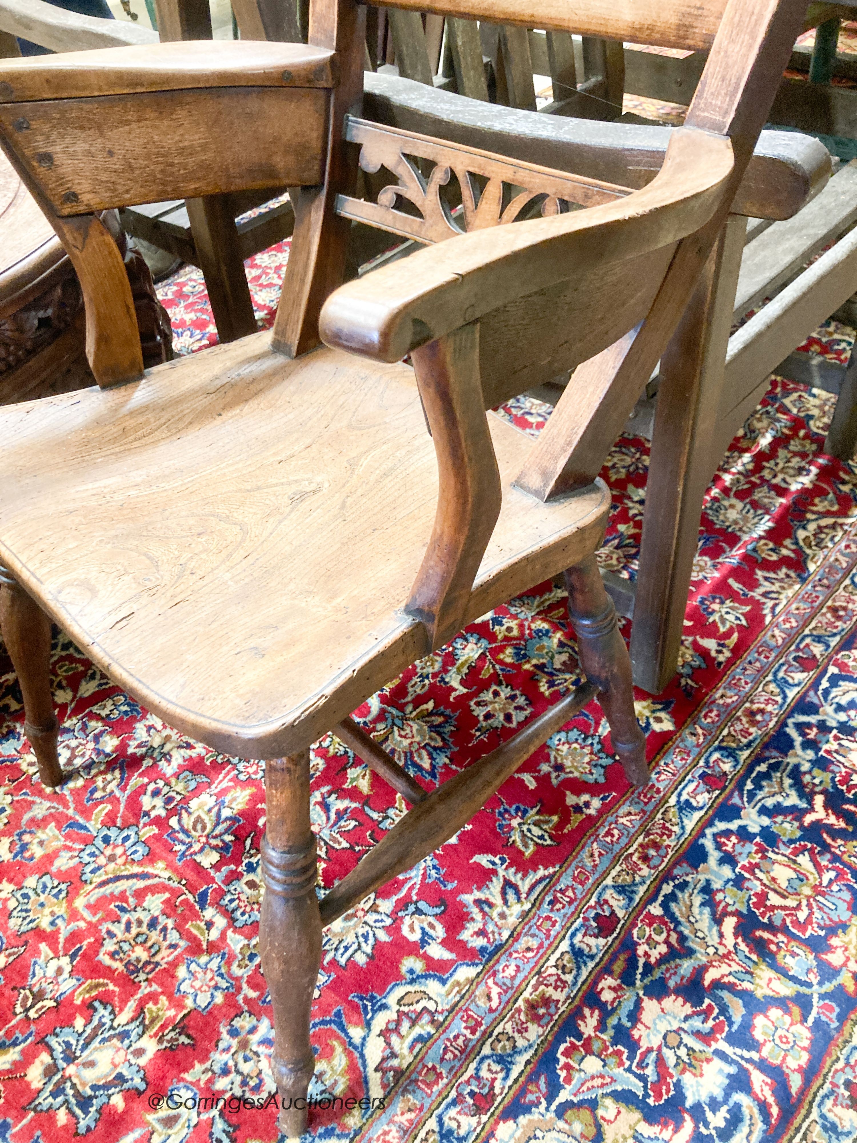 An early Victorian elm and beech Windsor armchair, width 54cm, depth 44cm, height 112cm